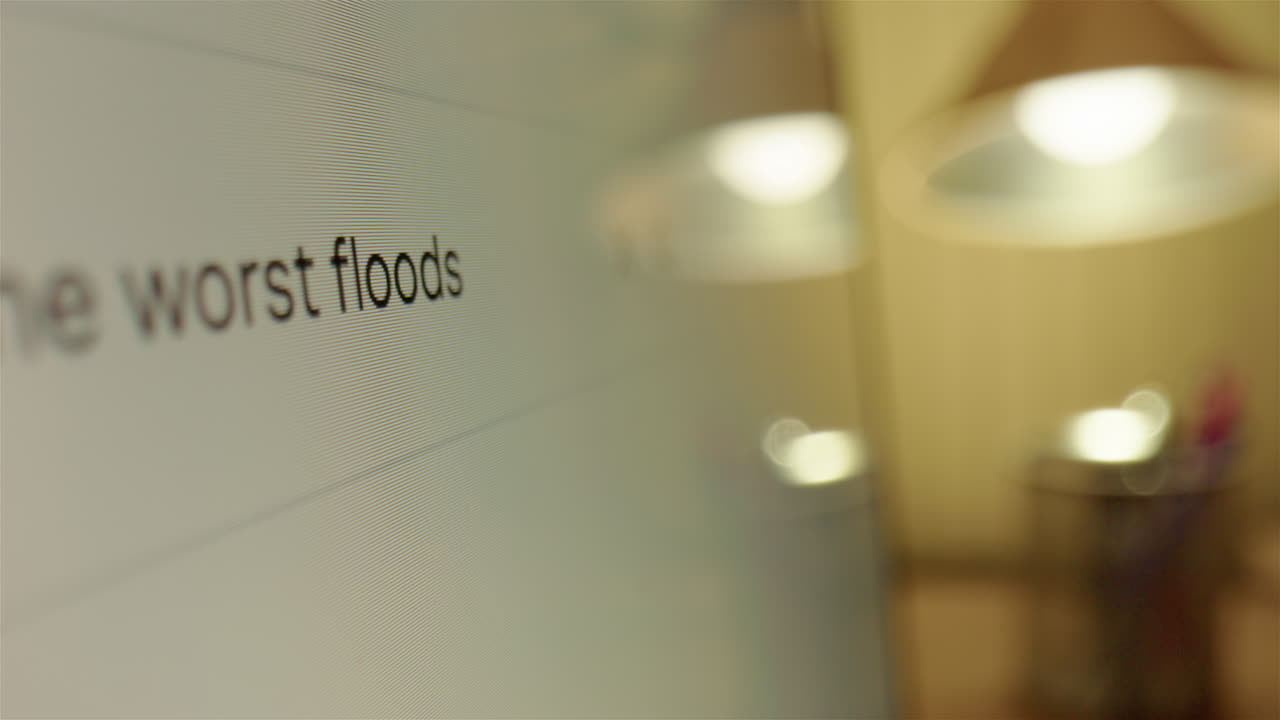 Querying on internet via web browser what the worst floods ever seen is, closeup