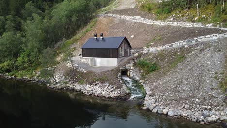 markani hydroelectric powerplant in vaksdal norway - rotating close aerial of small local powerplant - 10gwh yearly production and owned by aventron and operated by captiva asset management