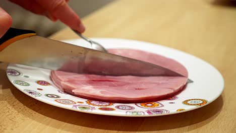 cooked ham is cut into small pieces