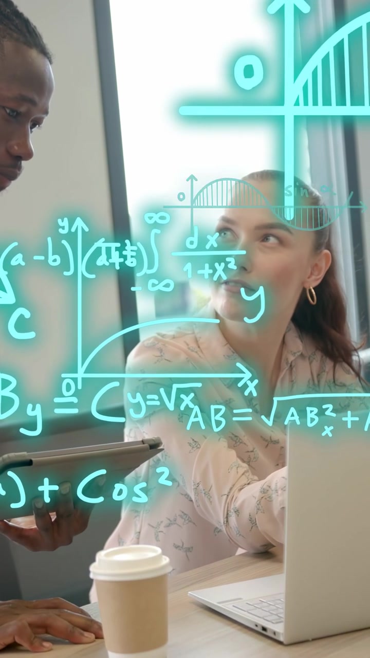 Vertical video: Man pointing tablet causing teal math overlay while woman using laptop for business