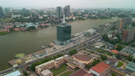 traffic and cityscape of falomo bridge, lagos law school and the civic centre tower in lagos nigeria