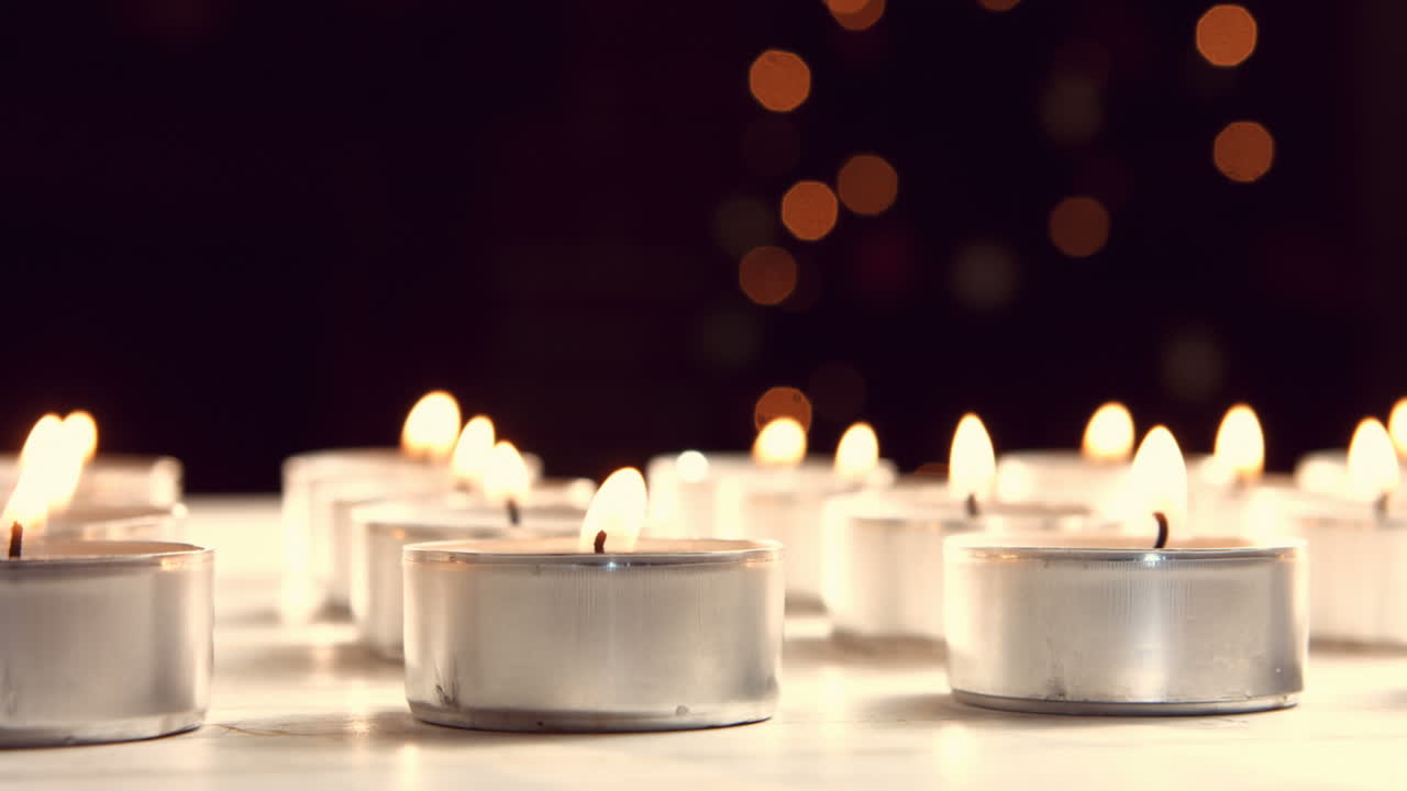 View of candles burning
