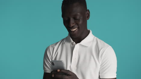 African-american-man-on-blue-background.