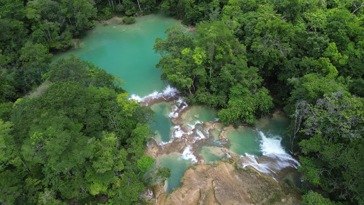 Aerial drone overview of Cascadas Roberto Barrios featuring waterfalls and turquoise pools, static