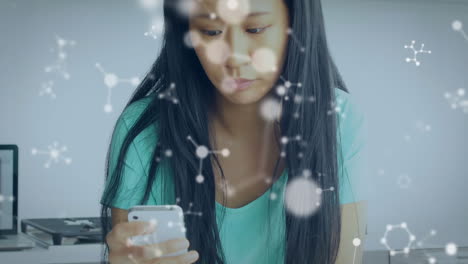 animation of molecules and data processing over woman with smartphone