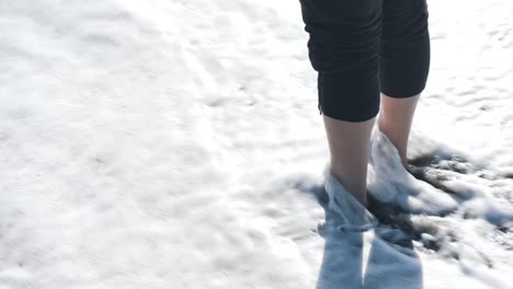 standing barefoot in the shore