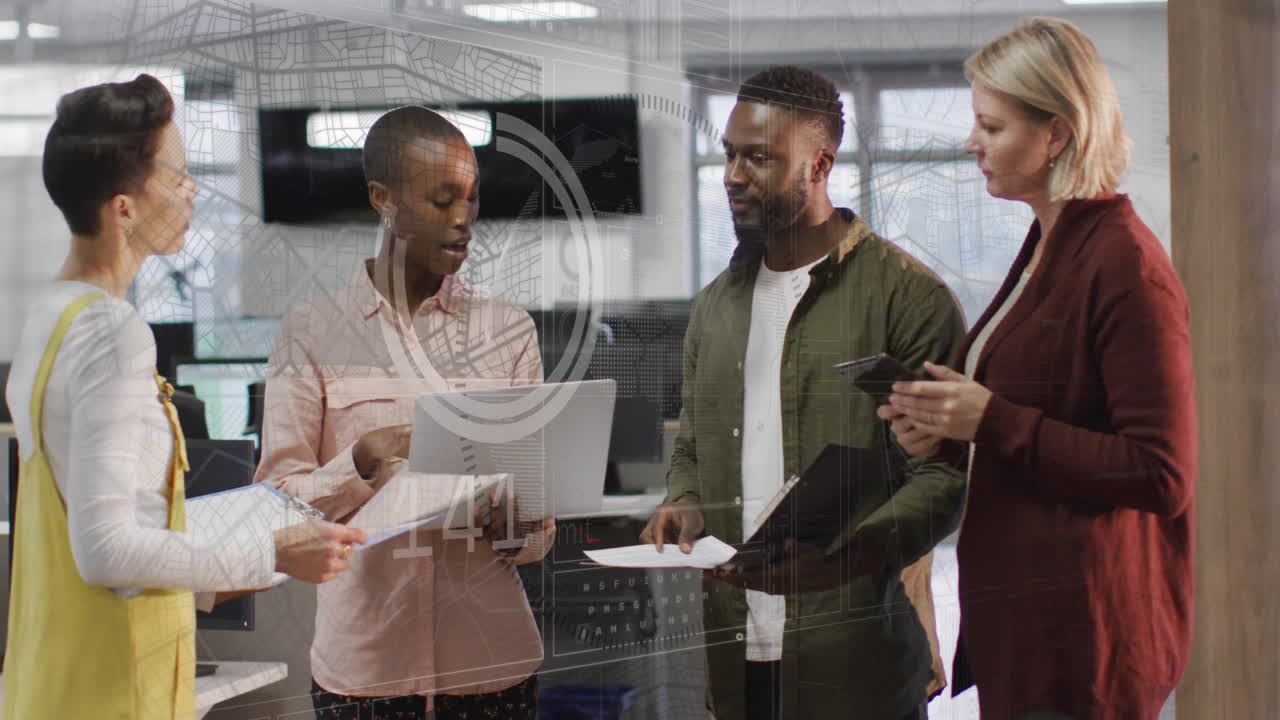 Animation of financial data processing over diverse colleagues discussing work in office