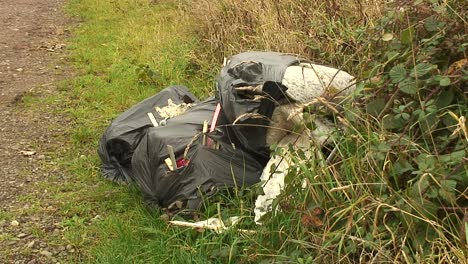 carpet fitting waste dumped in a field gateway by criminals