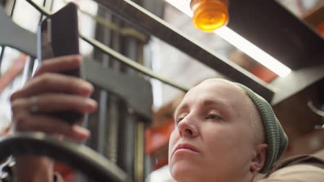 person operating machinery in a warehouse