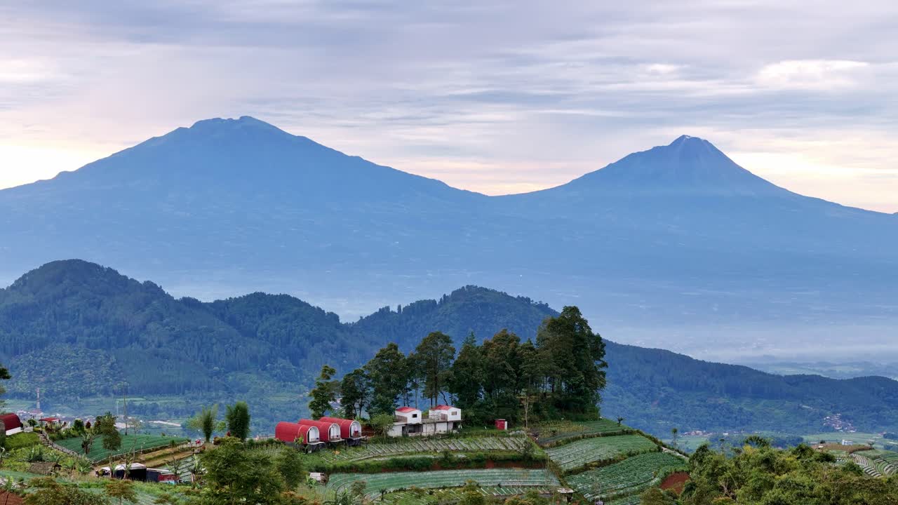 Beautiful house scenery on the highland with mountain background.