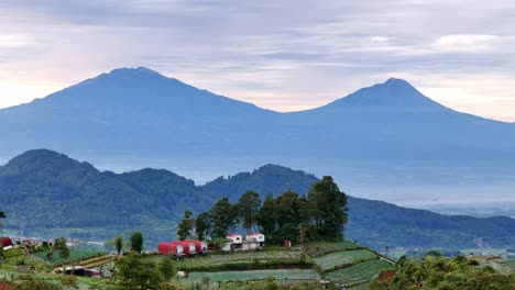 beautiful house scenery on the highland with mountain background.