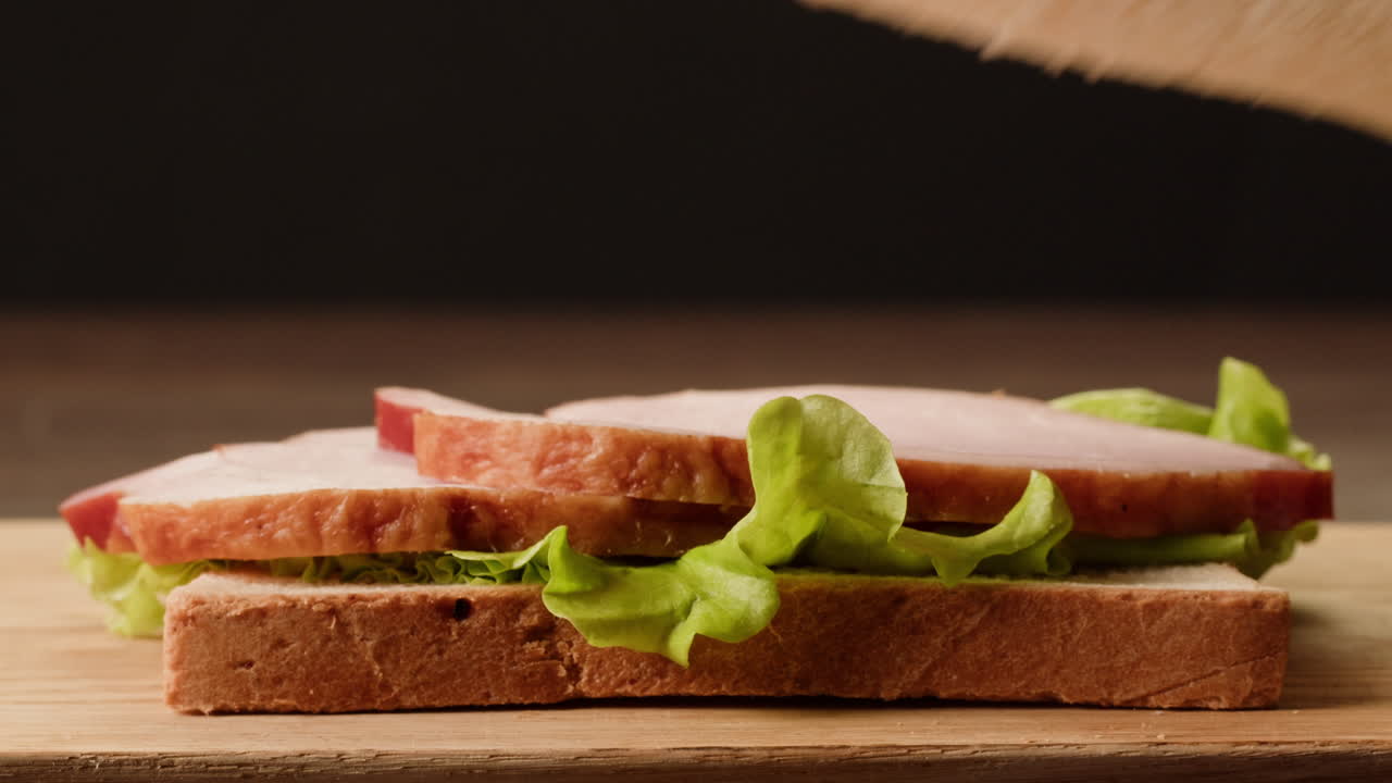 Making a Ham and Lettuce Sandwich