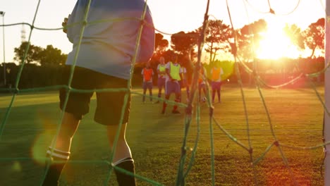 female soccer player stopping the ball in goal 4k