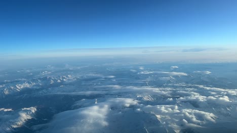 awesome view of the italian alps mountains flying southbound at 10000m high