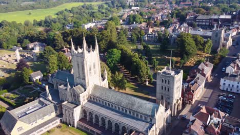 st edmundsbury cathedral aerial view with urban city - drone tracking flying shot