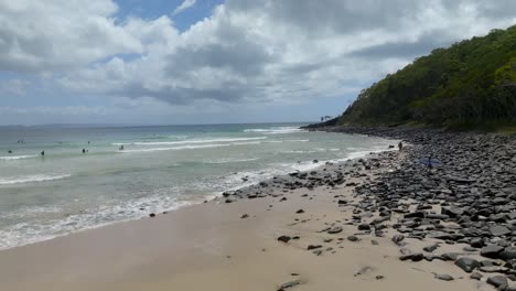 noosa drone tea tree beach on a sunny day, australia