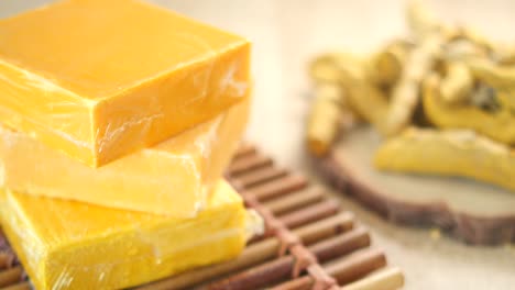 stack of yellow handmade soap bars