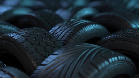 car tires in elegant studio lighting. the film is looped, arranged in an interesting way in a warehouse or store, the background of the car industry.