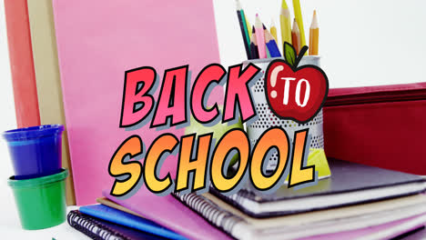 animation of back to school text over school items