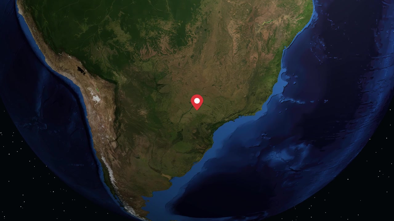 Digital globe rotates and zooms into South America pinpointing Presidente Prudente with data overlay