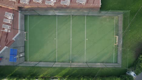 aerial footage over empty football pitch, mallorca, spain