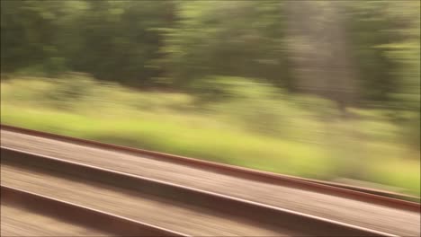 A-passenger-view-of-a-mainline-train-journey-in-England,-United-Kingdom,-from-Retford-to-King's-Cross-Station