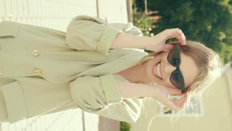 woman in stylish jacket and sunglasses