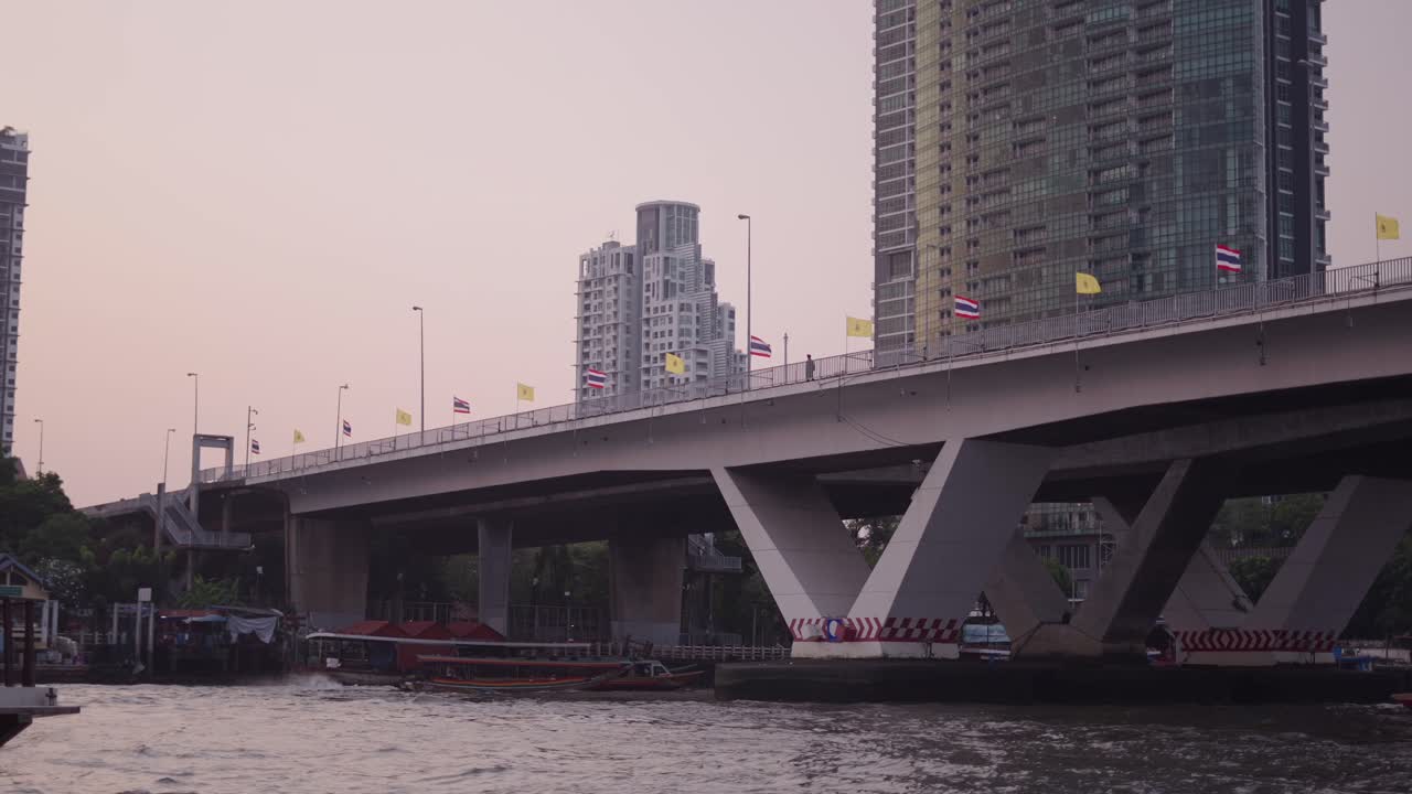 Bangkok River Bridge at Sunset with Boats