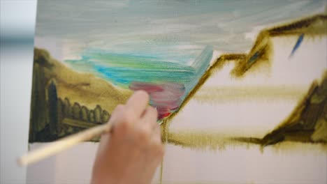 artist painting a landscape
