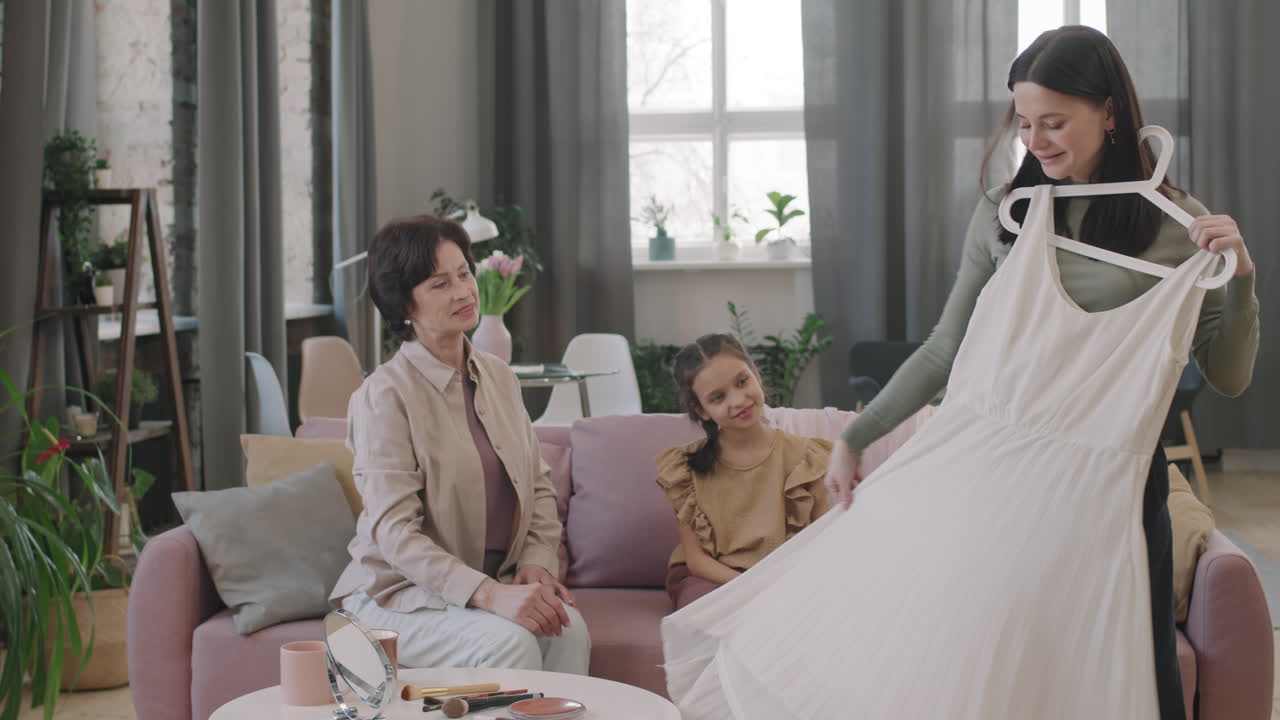 Family looking at a dress