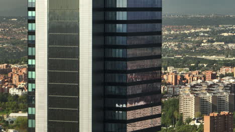 giant building modern district aerial shot madrid sunny day