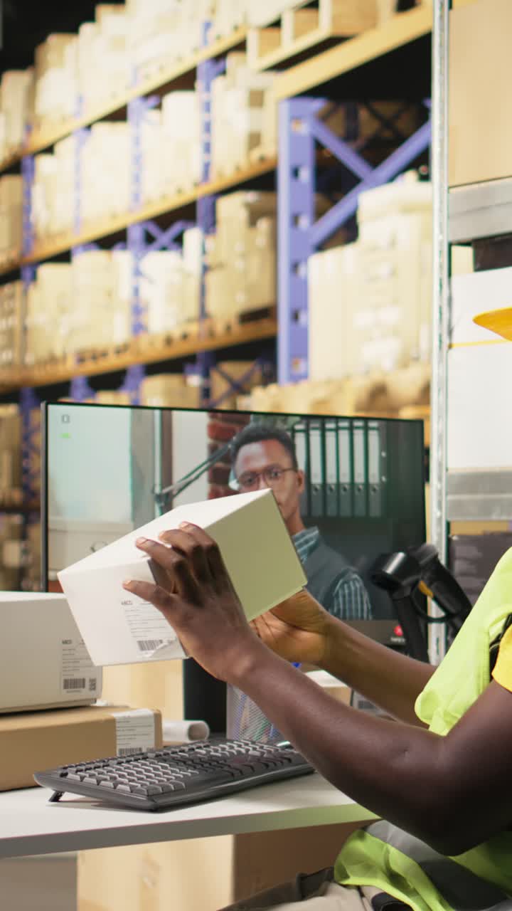 Vertical Video Warehouse clerk meeting on web video call with manager on computer
