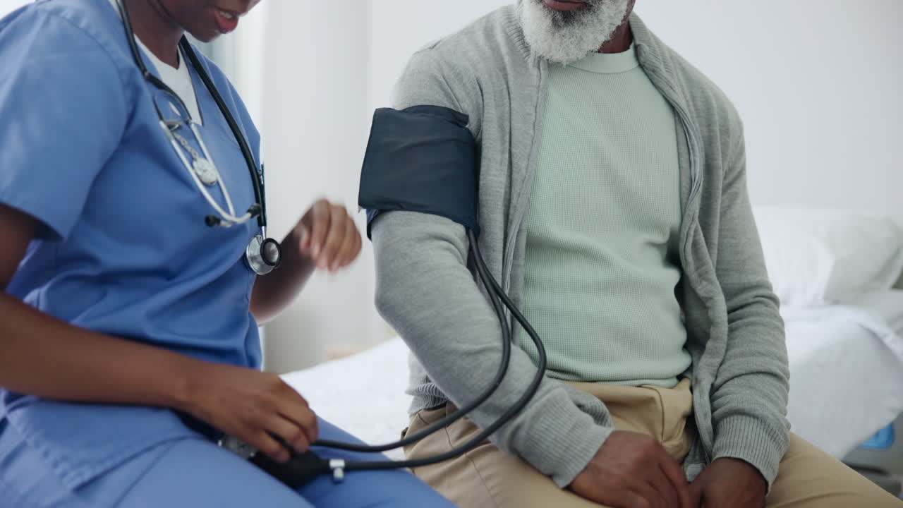 Nurse Taking Blood Pressure of Patient