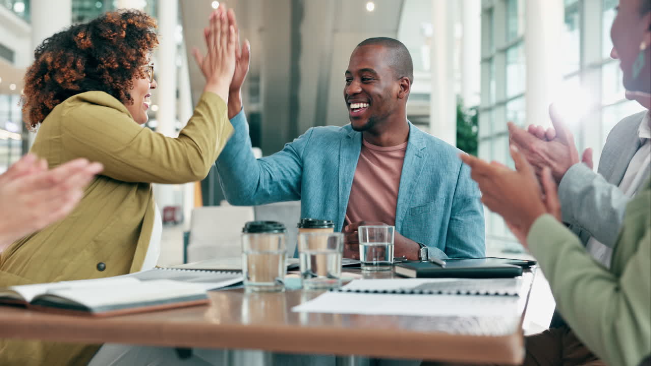 Business people, high five