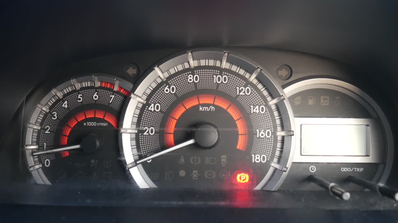 Dashboard of the car. Seat belt lamp sign is blinking