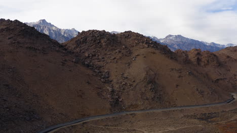 Aerial-Over-Eastern-Sierra-Valley-Floor-And-Mountain-Hillside