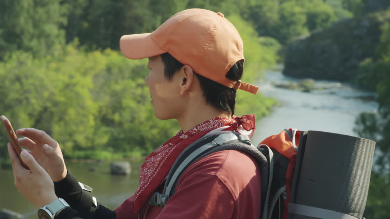 Female Tourist Using Maps on Smartphone