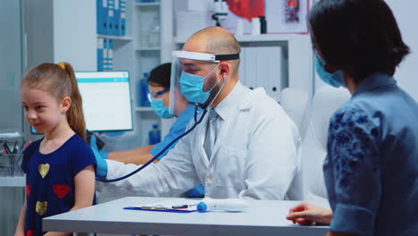 Doctor-listening-child-breath-with-stethoscope