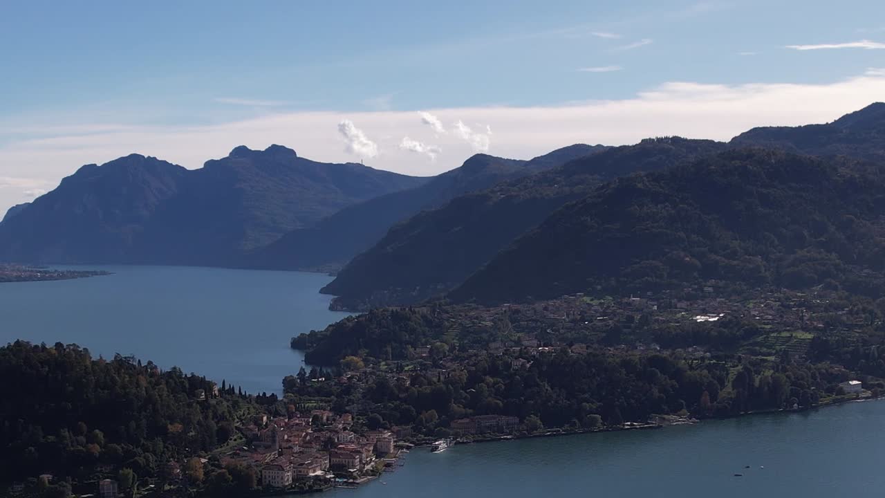 Stunning aerial view of the Alps and a lakeside village in Italy