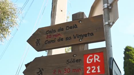 hiking signs in the village of deia