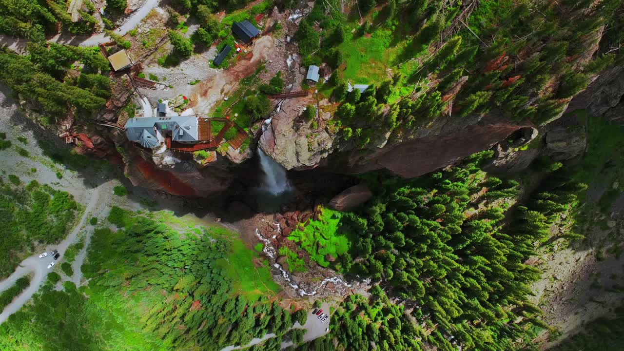 Summer Telluride Bridal Veil Falls Waterfall Colorado powerplant house aerial drone birdseye Box Canyon Black Bear Pass Road Rocky Mountains 4wd hiking blue sky cliffside Uncompahgre Forest down