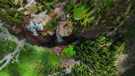 summer telluride bridal veil falls waterfall colorado powerplant house aerial drone birdseye box canyon black bear pass road rocky mountains 4wd hiking blue sky cliffside uncompahgre forest down