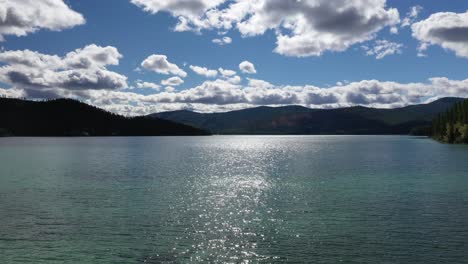 amazing sunset and glistening water of lake tahoe, usa - aerial shot