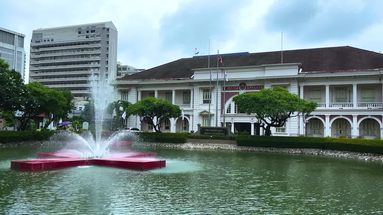 In front of the classic building of The Thai Red Cross Society.