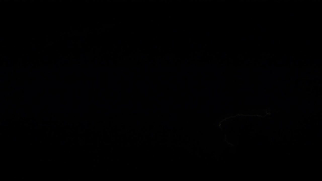Thunder Cracks Through the Stillness of a Night Sky