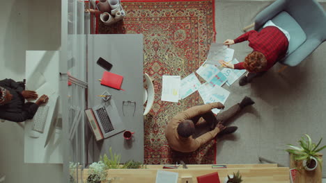 time lapse of coworkers discussing business project in office