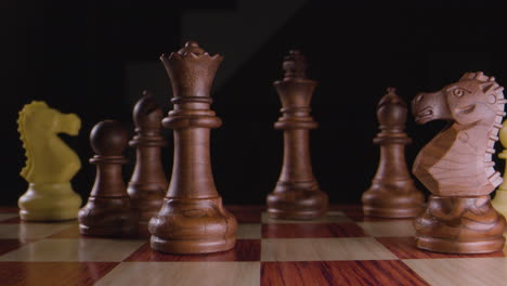 chess. queen takes pawn. macro slow motion.