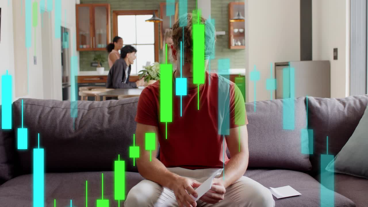 Man entering with papers, sitting on couch reviewing finances with candlestick overlaying papers