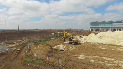 airport construction site with excavator