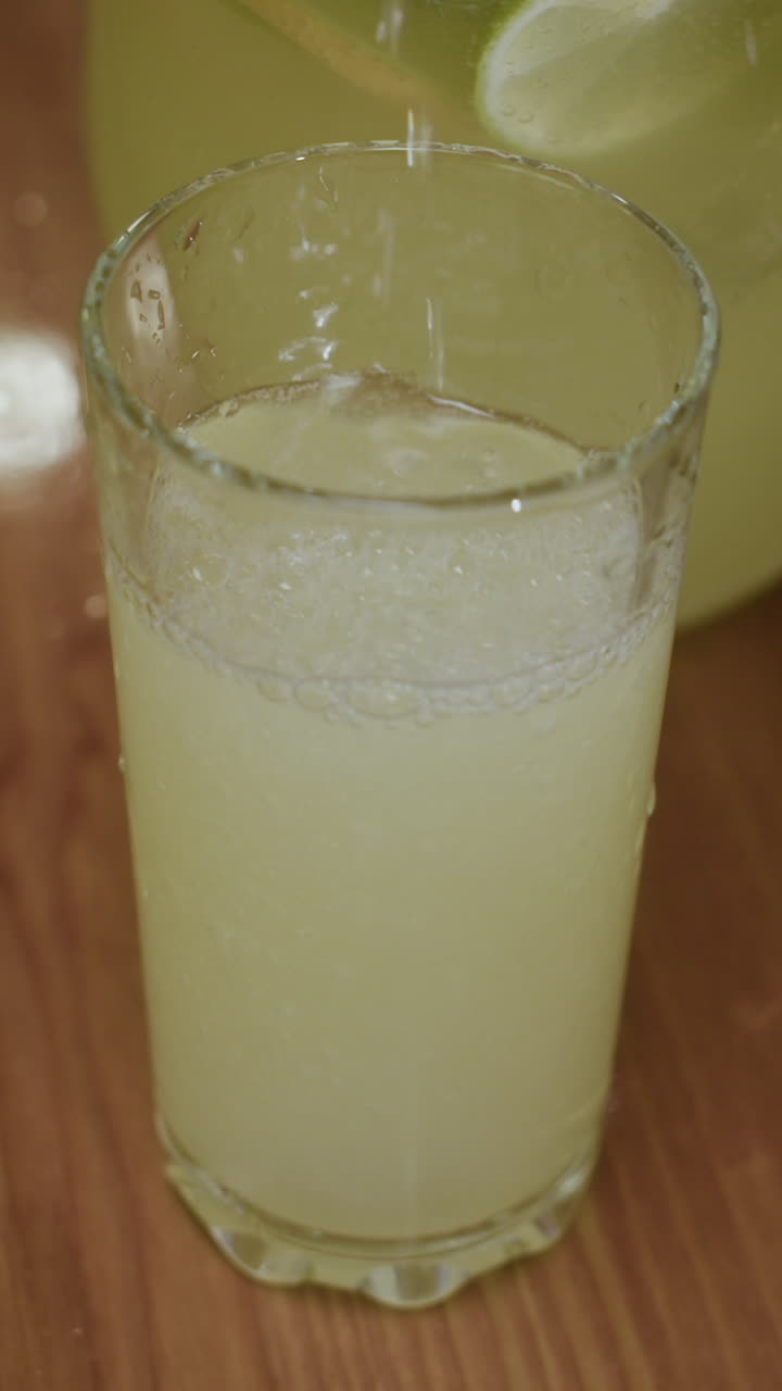 Preparing a refreshing lemonade cocktail